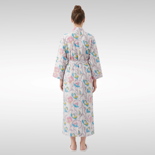 White lemon sky blossoms women's cotton kimono. Fresh white, yellow,
and blue floral print lightweight cotton dressing gown.