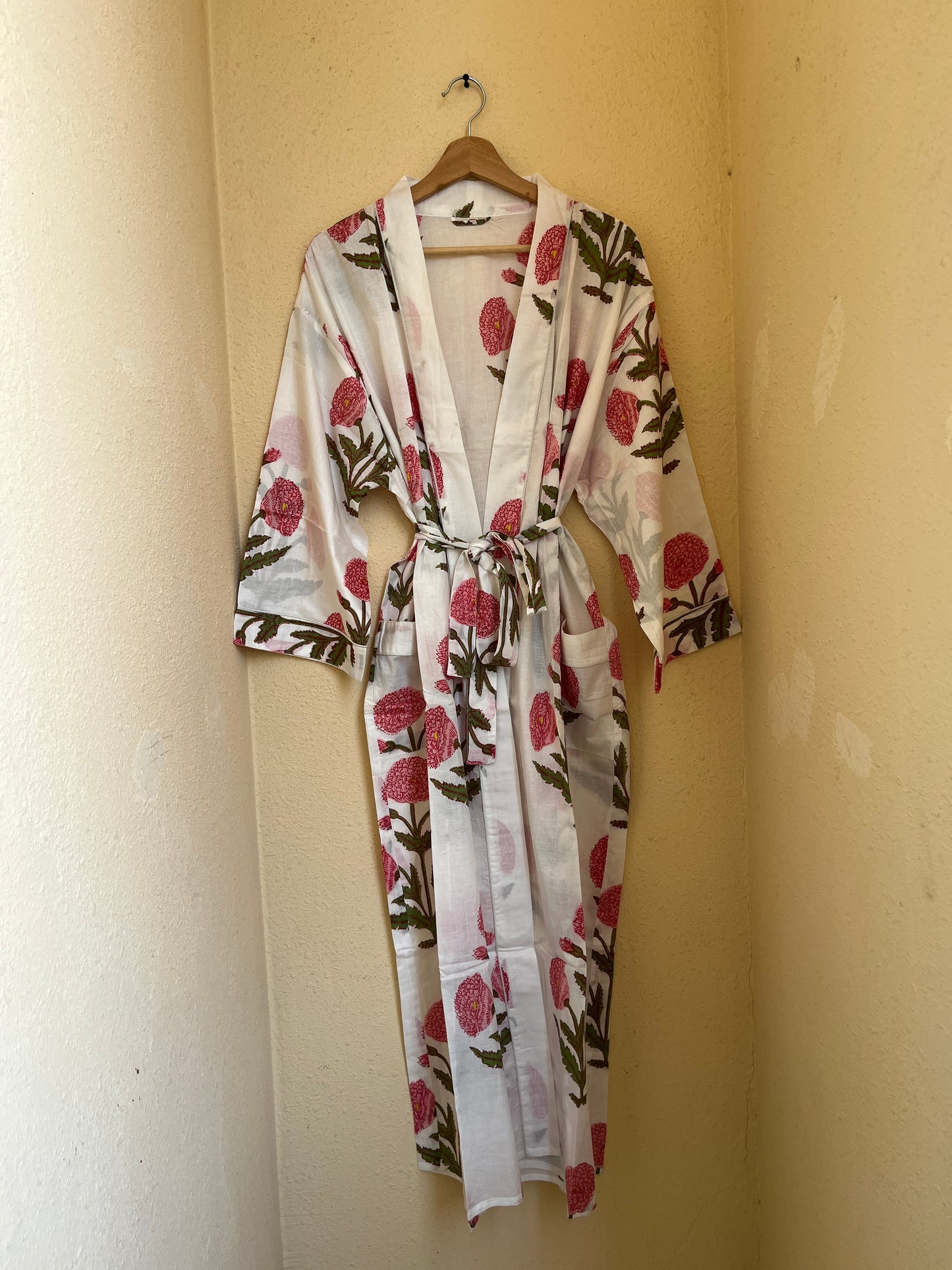 Petal Cloud pink women's cotton kimono. Soft, airy pink floral
block print lightweight cotton robe for lounging at home.