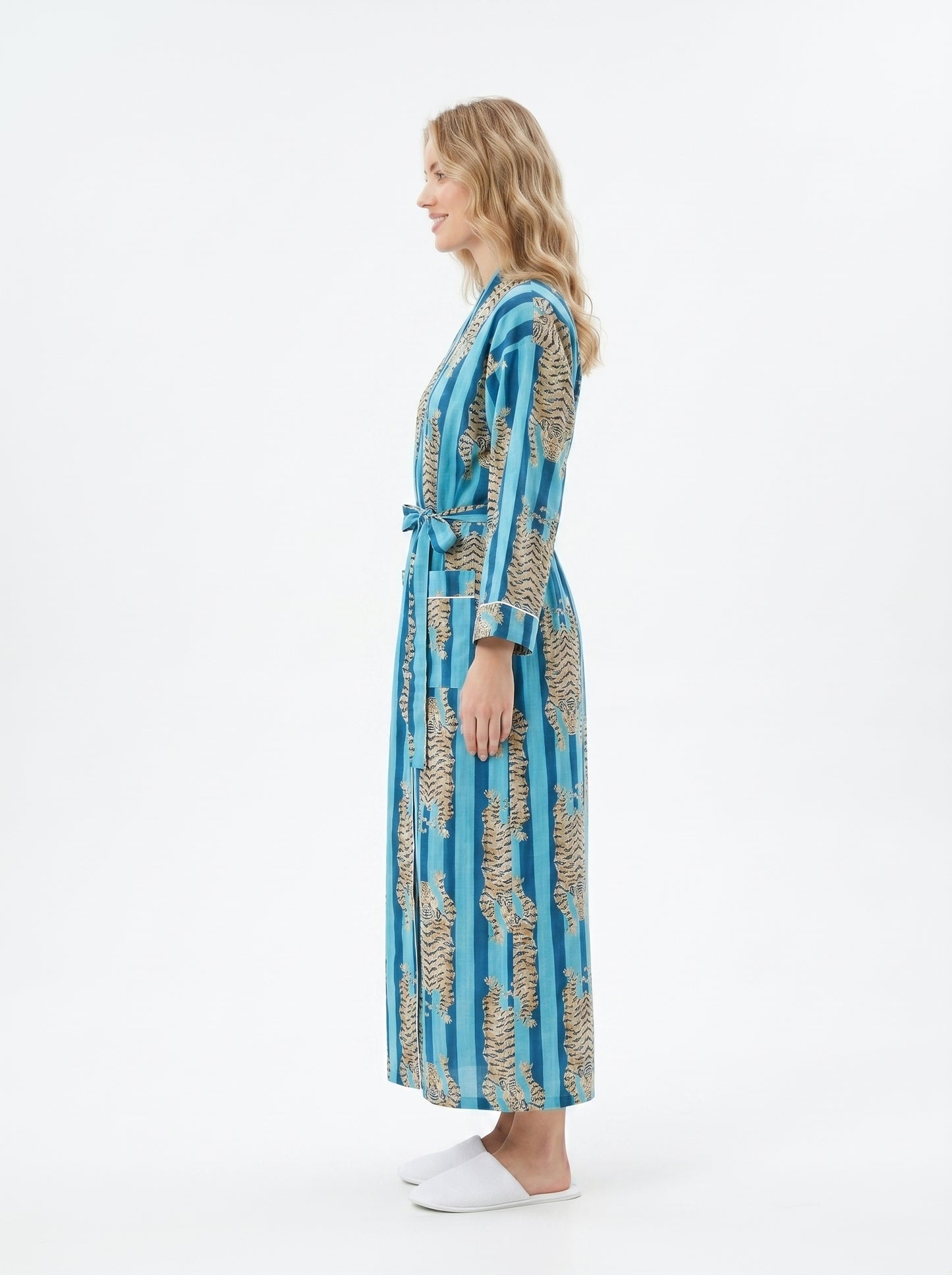 Women's tiger and blue stripes Tibetan cotton kimono robe. Lightweight lounge
robe featuring an eclectic tiger motif on a striped blue background.