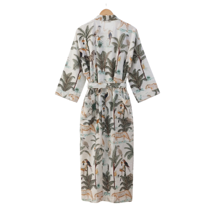 White safari women's cotton kimono. Clean white lightweight
 cotton robe featuring detailed safari animal and jungle illustrations.