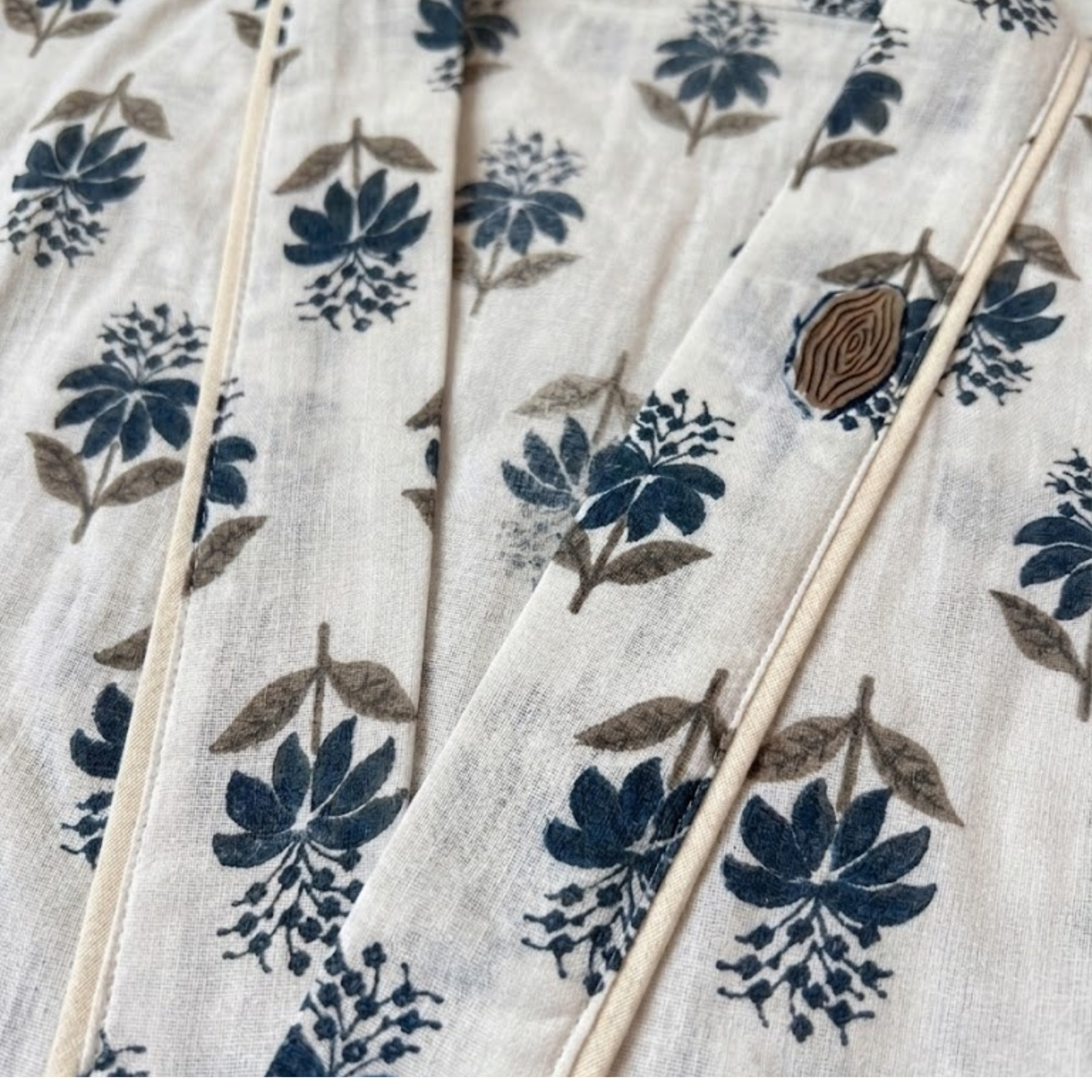Blue whisper blooms women's cotton kimono. Delicate
 pastel blue floral print lightweight cotton lounge robe.