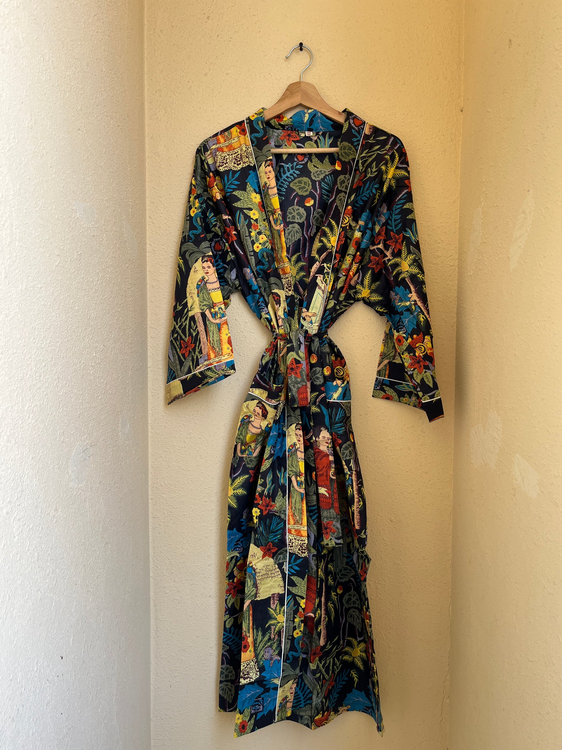 Black Farida women's cotton kimono. Elegant black and white 
patterned lightweight cotton robe with long sleeves and waist tie.